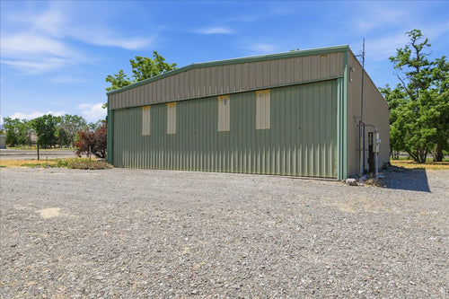 RIVERFRONT HOME WITH HANGER ON PRIVATE LANDING STRIP
