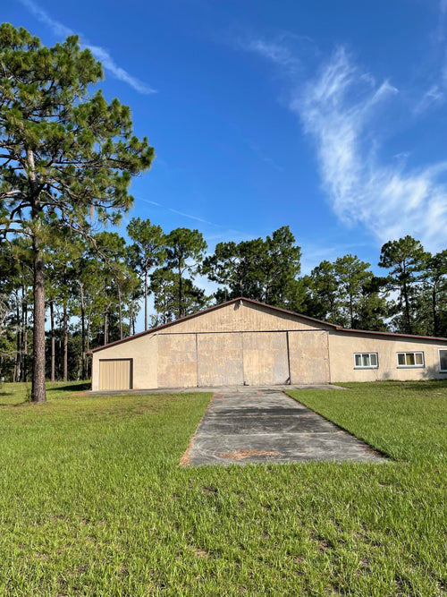 HANGAR & APARTMENT ON PRIVATE RUNWAY 5 ACRES OF PRISTINE WOODLAND