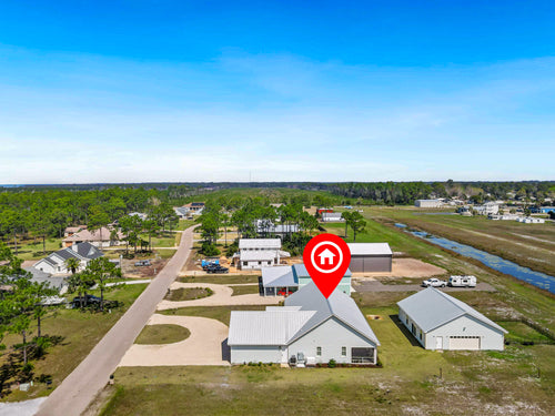 A PILOT’S DREAM: CUSTOM HOME W/DEEDED RUNWAY ACCESS AT COSTIN AIRPORT A51 PORT ST. JOE, FL