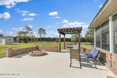 CUSTOM HOME WITH HANGAR AT CUYLER FLD