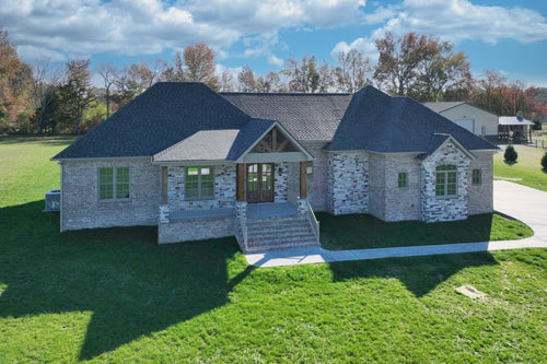 NEW CONSTRUCTION HOME WITH AIRPARK HANGER