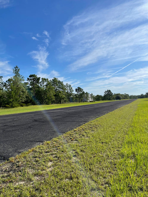 HANGAR & APARTMENT ON PRIVATE RUNWAY 5 ACRES OF PRISTINE WOODLAND