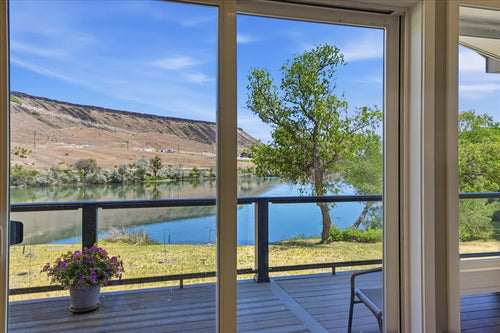 RIVERFRONT HOME WITH HANGER ON PRIVATE LANDING STRIP