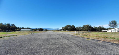 BEAUTIFUL HOME WITH HANGAR ON ACREAGE