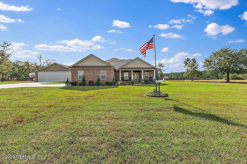 CUSTOM HOME WITH HANGAR AT CUYLER FLD