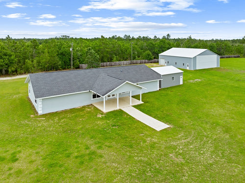 AUCTION! HOME-HANGAR-AIRSTRIP - 80± ACRES