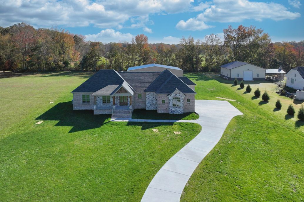 NEW CONSTRUCTION HOME WITH AIRPARK HANGER