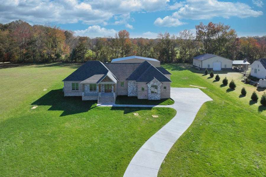 NEW CONSTRUCTION HOME WITH AIRPARK HANGER