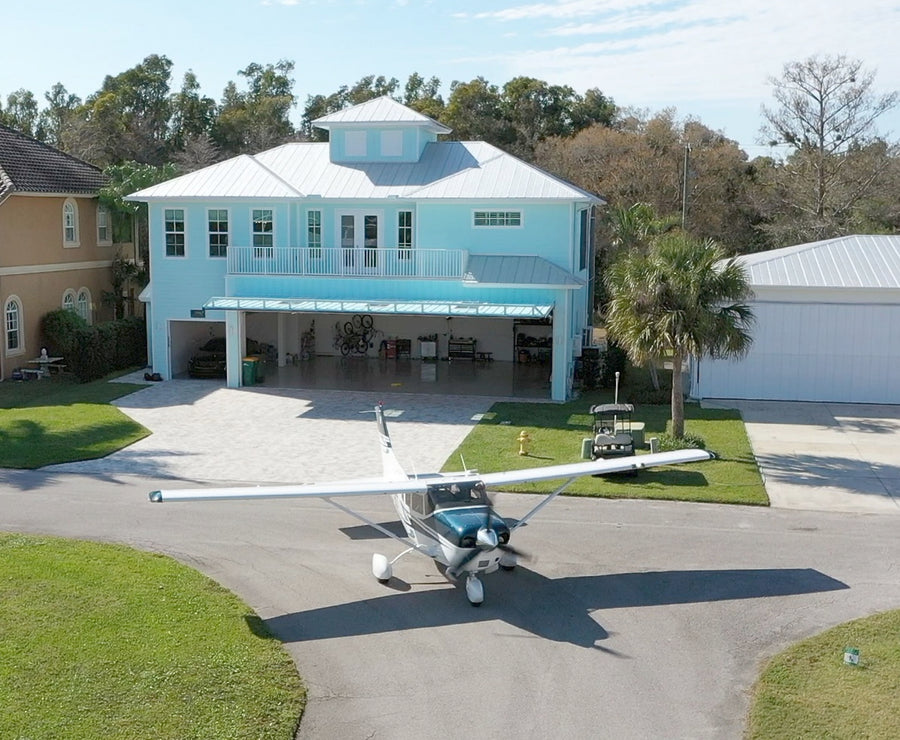 KEY WEST INSPIRED HANGAR HOME IN NAPLES, FL