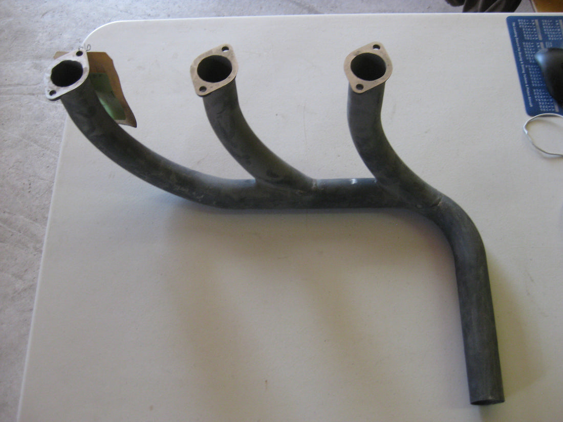 33420-002 EXHAUST MANIFOLD, RH ENG, INBD
