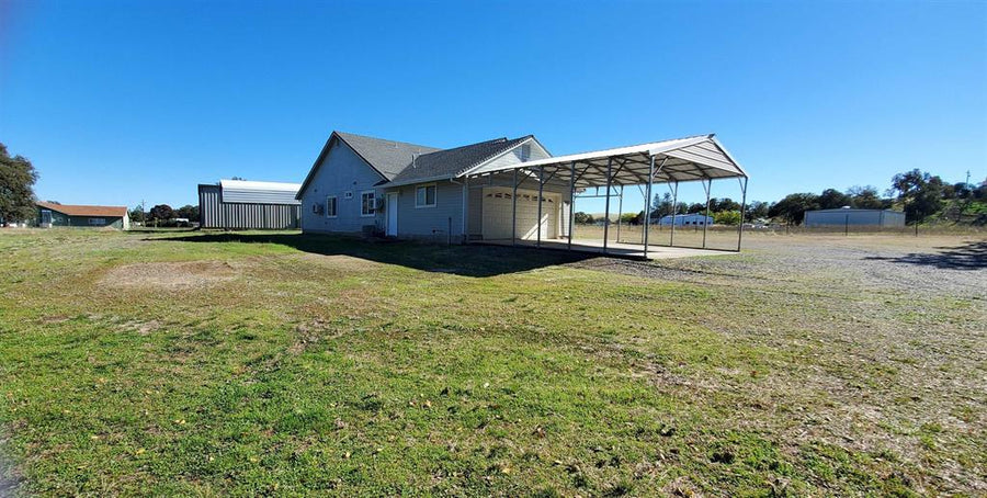 BEAUTIFUL HOME WITH HANGAR ON ACREAGE