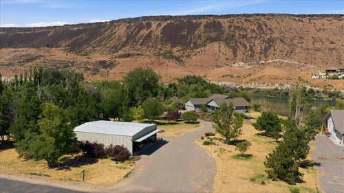 RIVERFRONT HOME WITH HANGER ON PRIVATE LANDING STRIP