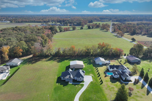 NEW CONSTRUCTION HOME WITH AIRPARK HANGER