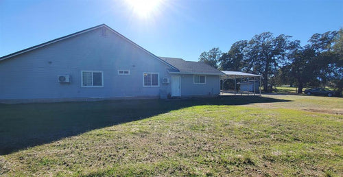 BEAUTIFUL HOME WITH HANGAR ON ACREAGE