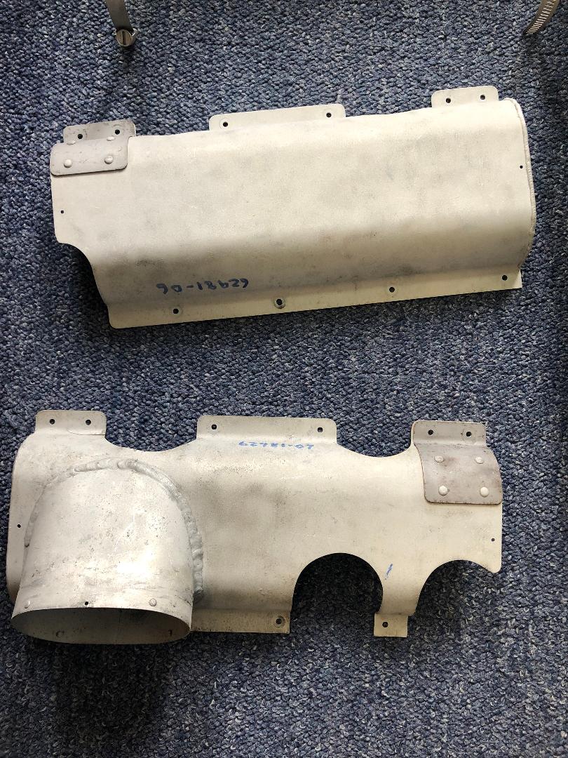 BOTH LEFT & RIGHT EXHAUST SHROUDS