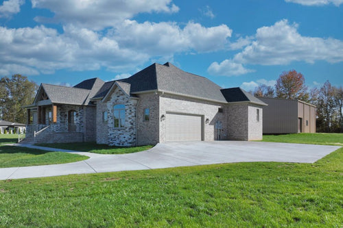 NEW CONSTRUCTION HOME WITH AIRPARK HANGER